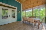 Screened-In Porch with Outdoor Dining Table for 6